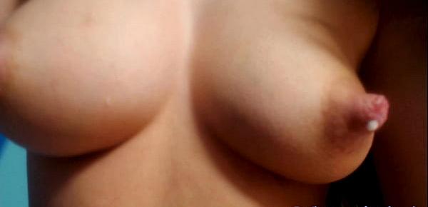  Young girl milking her big beutiful tits close up on camera